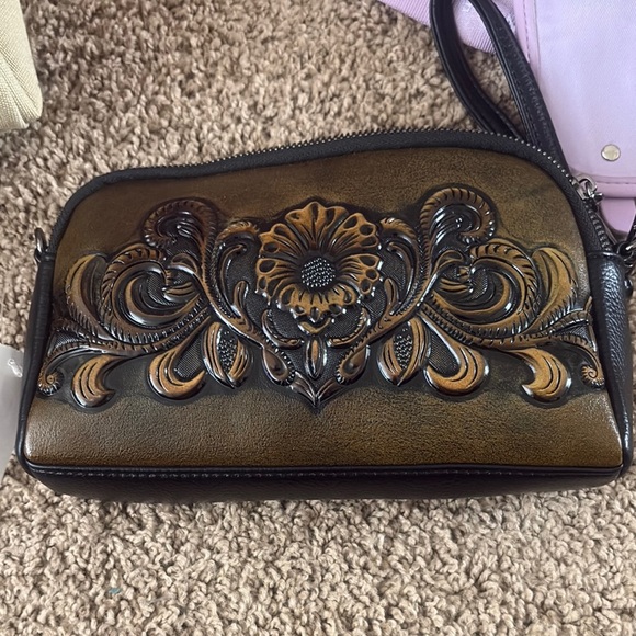 Brown and Black Embossed Leather Clutch with Ornate Design - Picture 1 of 3